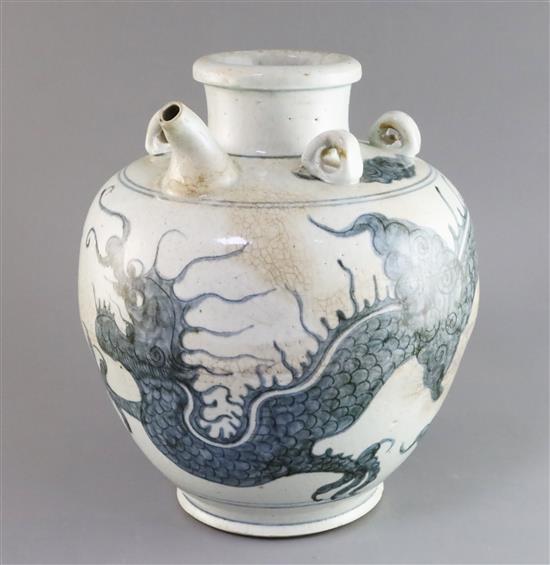 An Annamese blue and white wine storage vessel, 14th-16th century, H. 33cm, typical crazing and staining